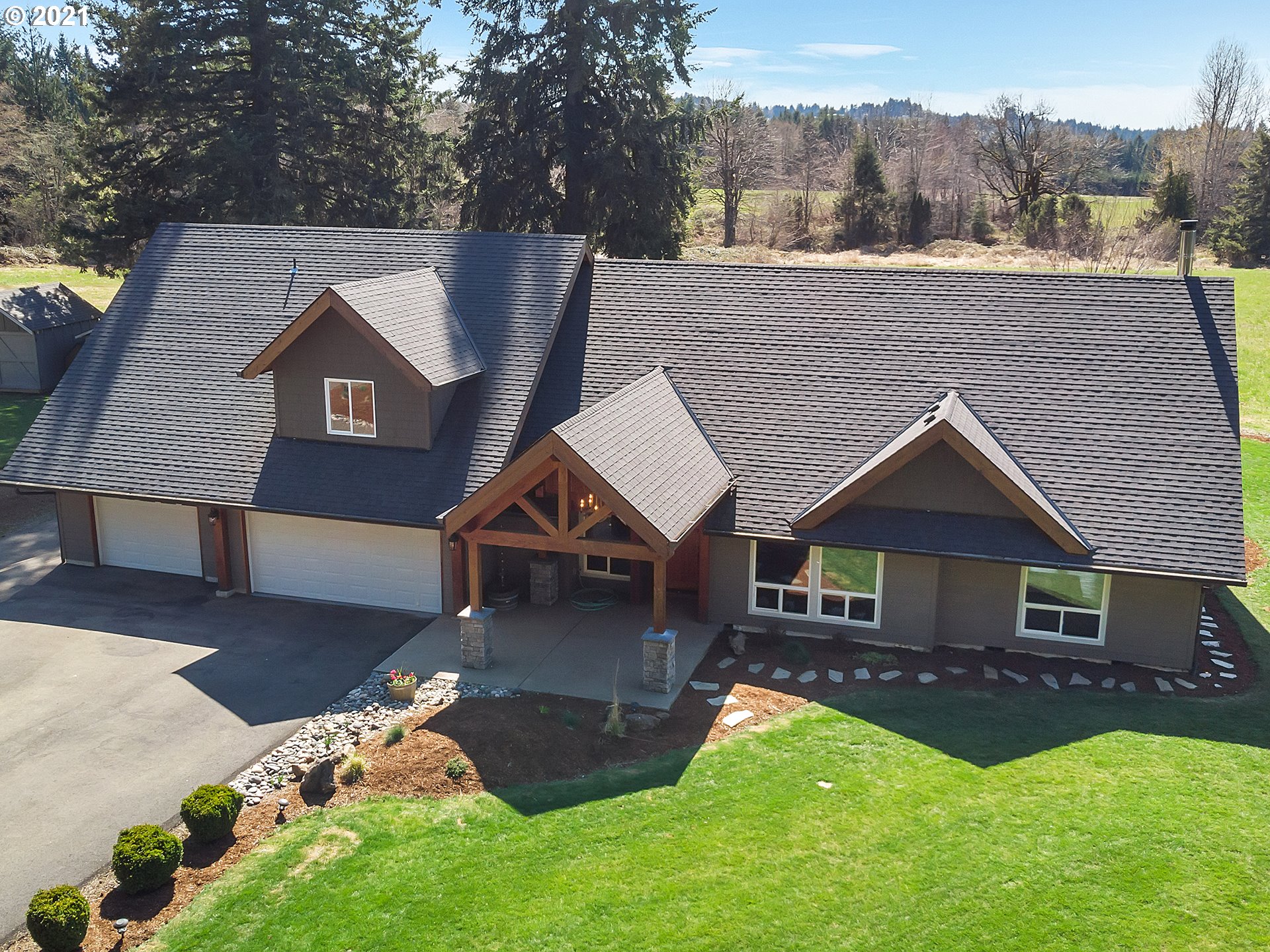 47280 Southeast Coalman Road Sandy, OR 97055 - Photo 29 of 32 a front view of a house with a yard