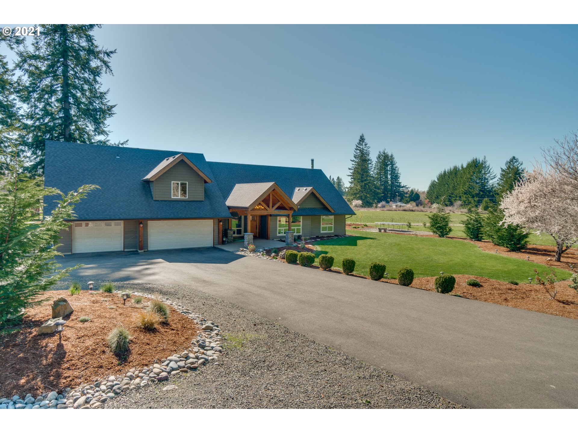 47280 Southeast Coalman Road Sandy, OR 97055 - Photo 30 of 32 a house with a yard