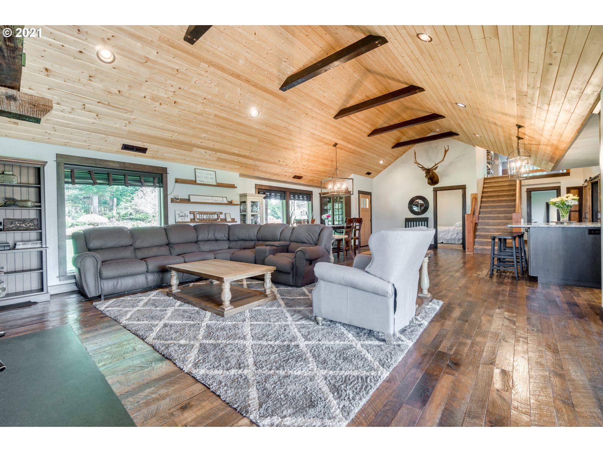 47280 Southeast Coalman Road Sandy, OR 97055 - Photo 5 of 32 a living room with furniture and a wooden floor