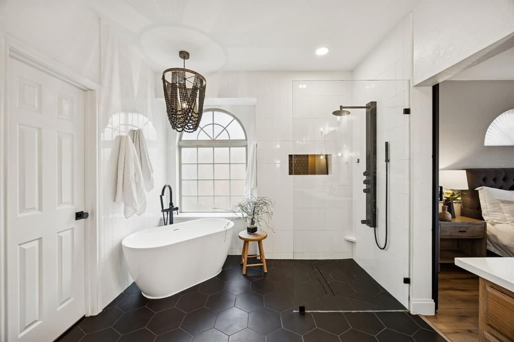 3608 Acropolis Way Plano, TX 75074 - Photo 18 of 40 a bathroom with a sink and a mirror