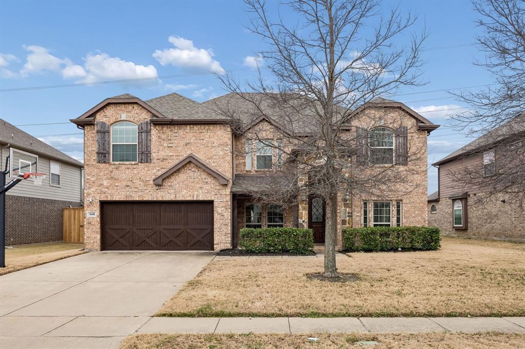 3608 Acropolis Way Plano, TX 75074 - Photo 2 of 40 a front view of a house with yard