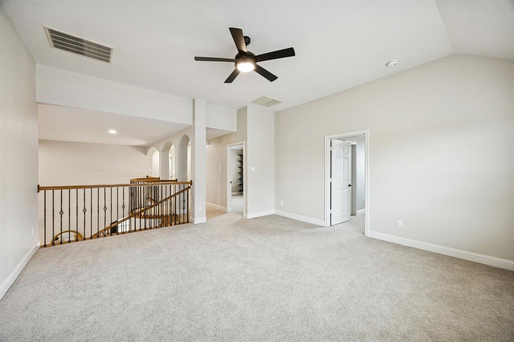 3608 Acropolis Way Plano, TX 75074 - Photo 21 of 40 a view of a livingroom with a ceiling fan