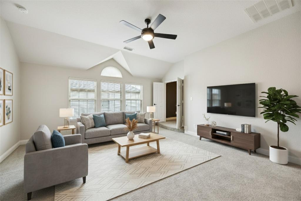 3608 Acropolis Way Plano, TX 75074 - Photo 22 of 40 a living room with furniture and a flat screen tv