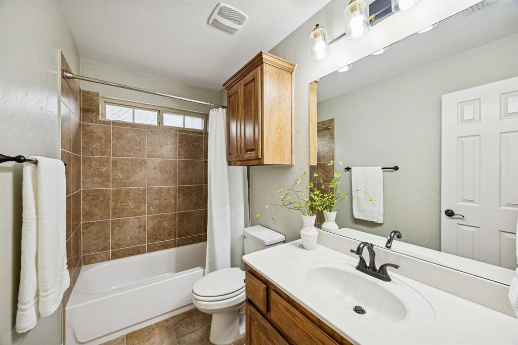 3608 Acropolis Way Plano, TX 75074 - Photo 31 of 40 a bathroom with a sink toilet and shower