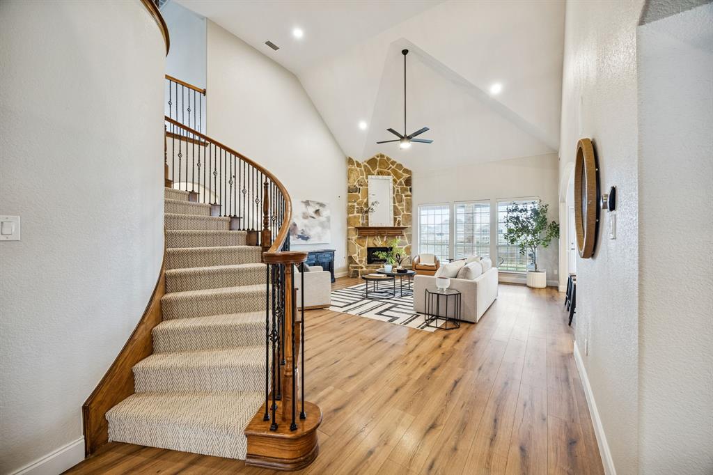 3608 Acropolis Way Plano, TX 75074 - Photo 7 of 40 a view of entryway and hall with wooden floor