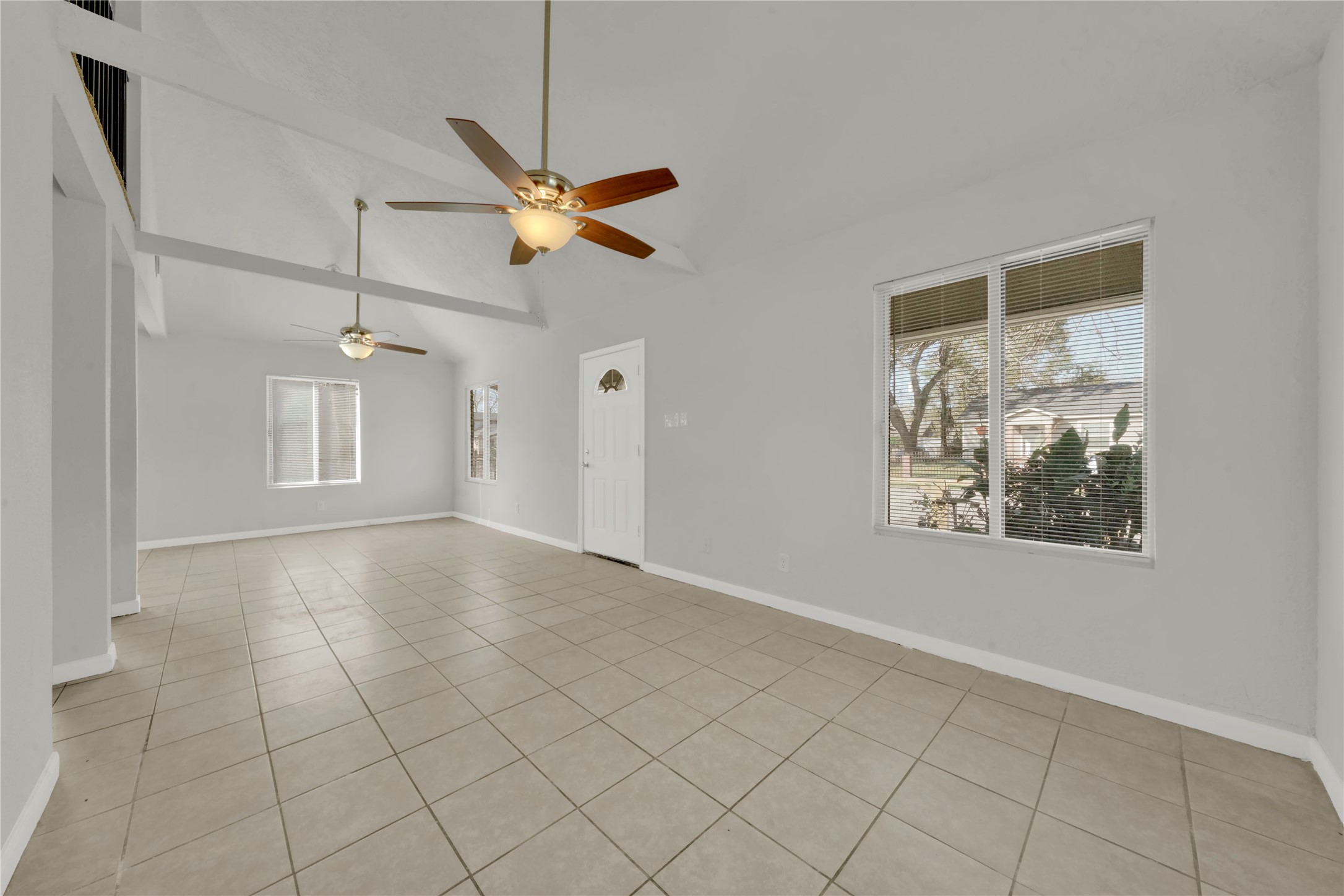 106 Hanover Street Houston, TX 77012 - Photo 6 of 49 a view of an empty room with a window
