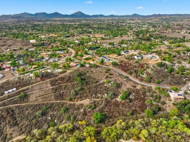 a view of a city with mountain