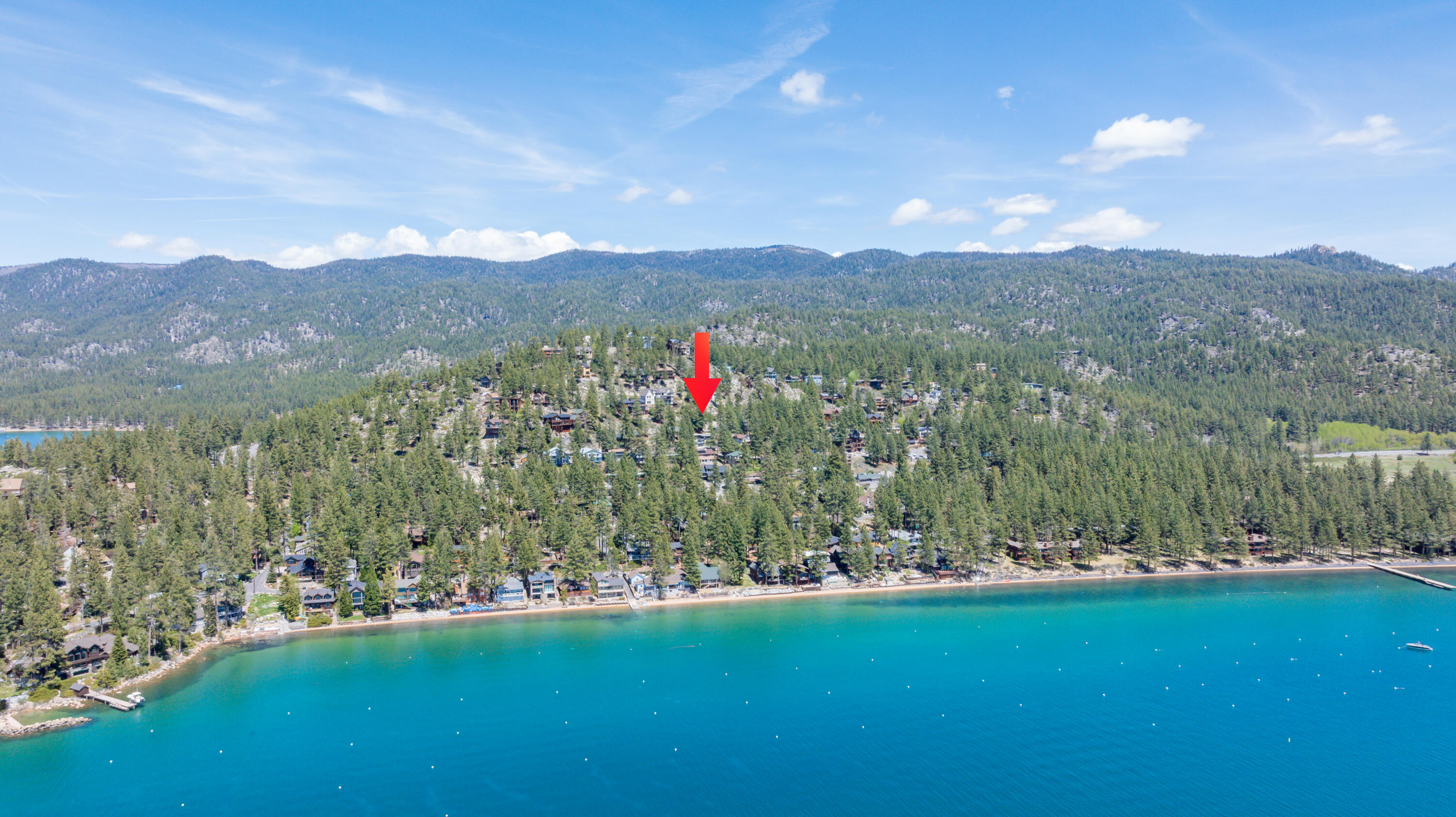 633 Don Drive Zephyr Cove, NV 89448 - Photo 14 of 38 a view of a green field with mountains in the background