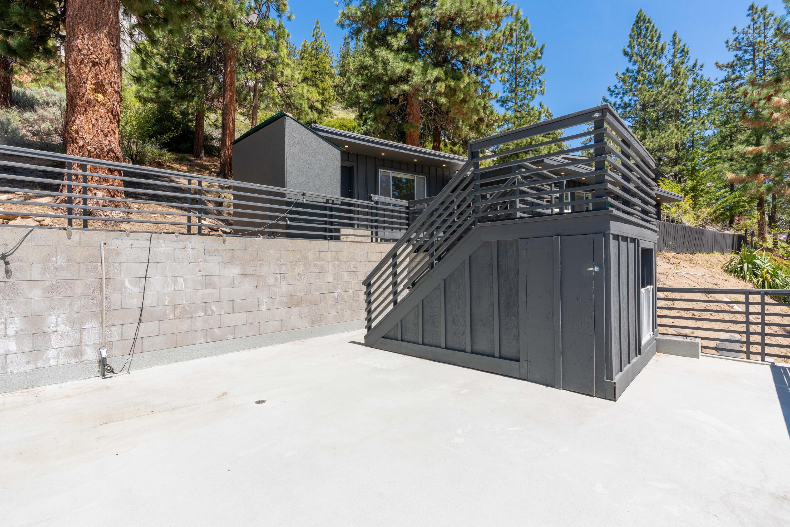 633 Don Drive Zephyr Cove, NV 89448 - Photo 17 of 38 a view of a house with a wooden fence