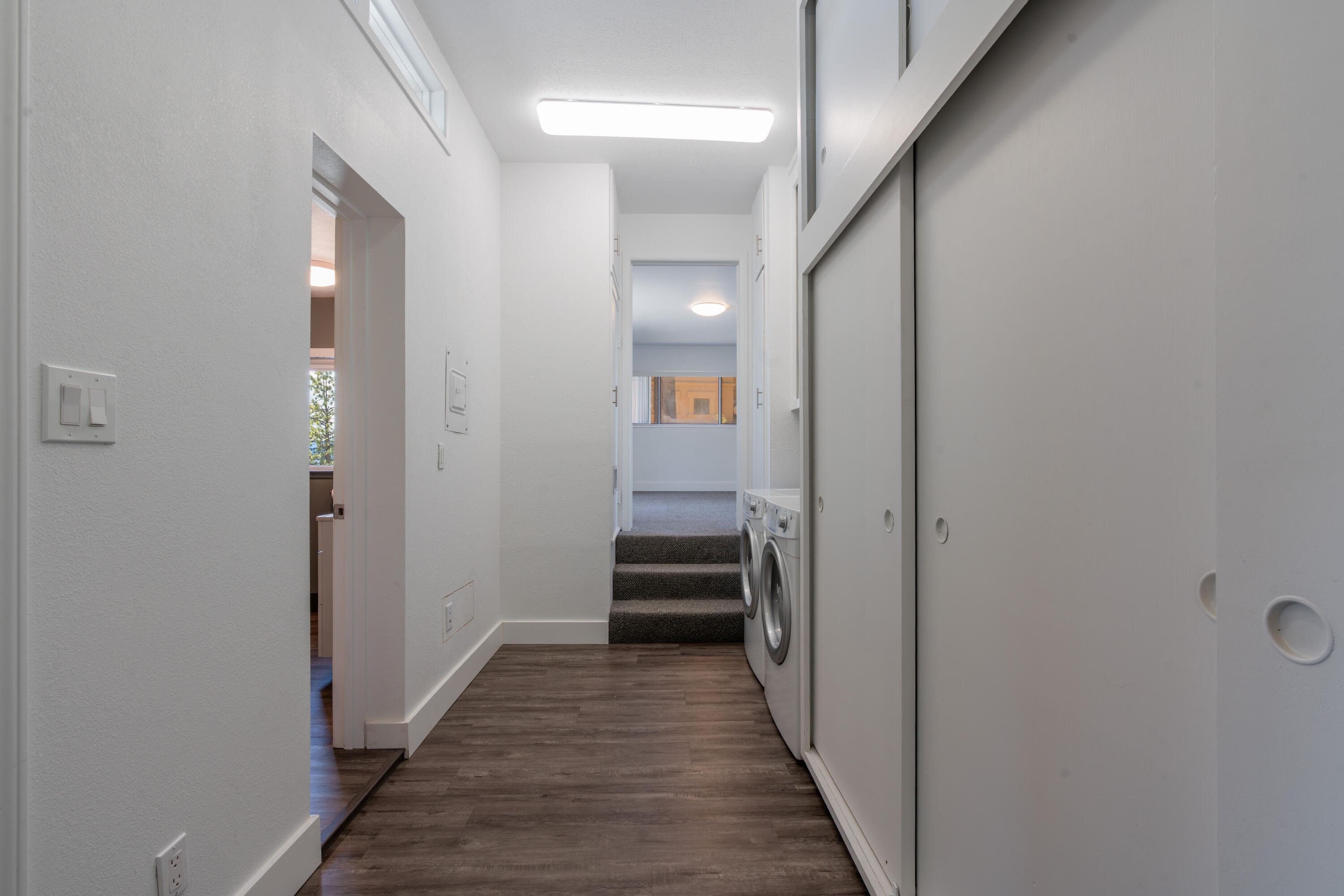 633 Don Drive Zephyr Cove, NV 89448 - Photo 23 of 38 a view of a hallway with wooden floor and a bathroom