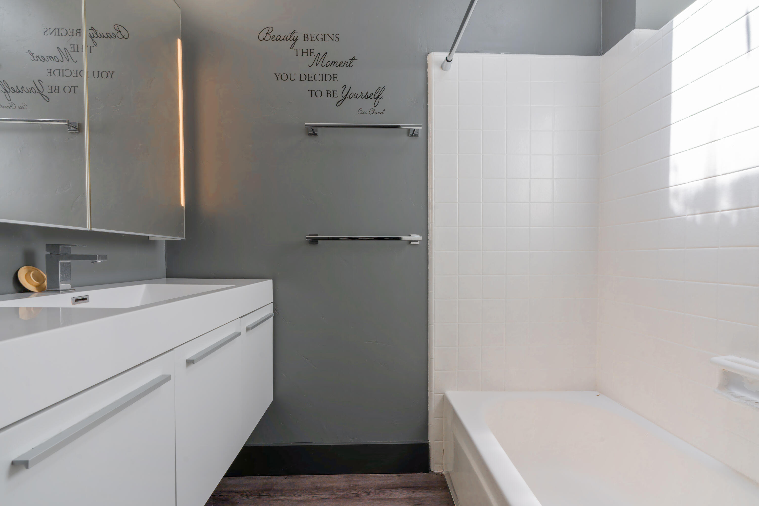 633 Don Drive Zephyr Cove, NV 89448 - Photo 30 of 38 a bathroom with a tub sink and vanity