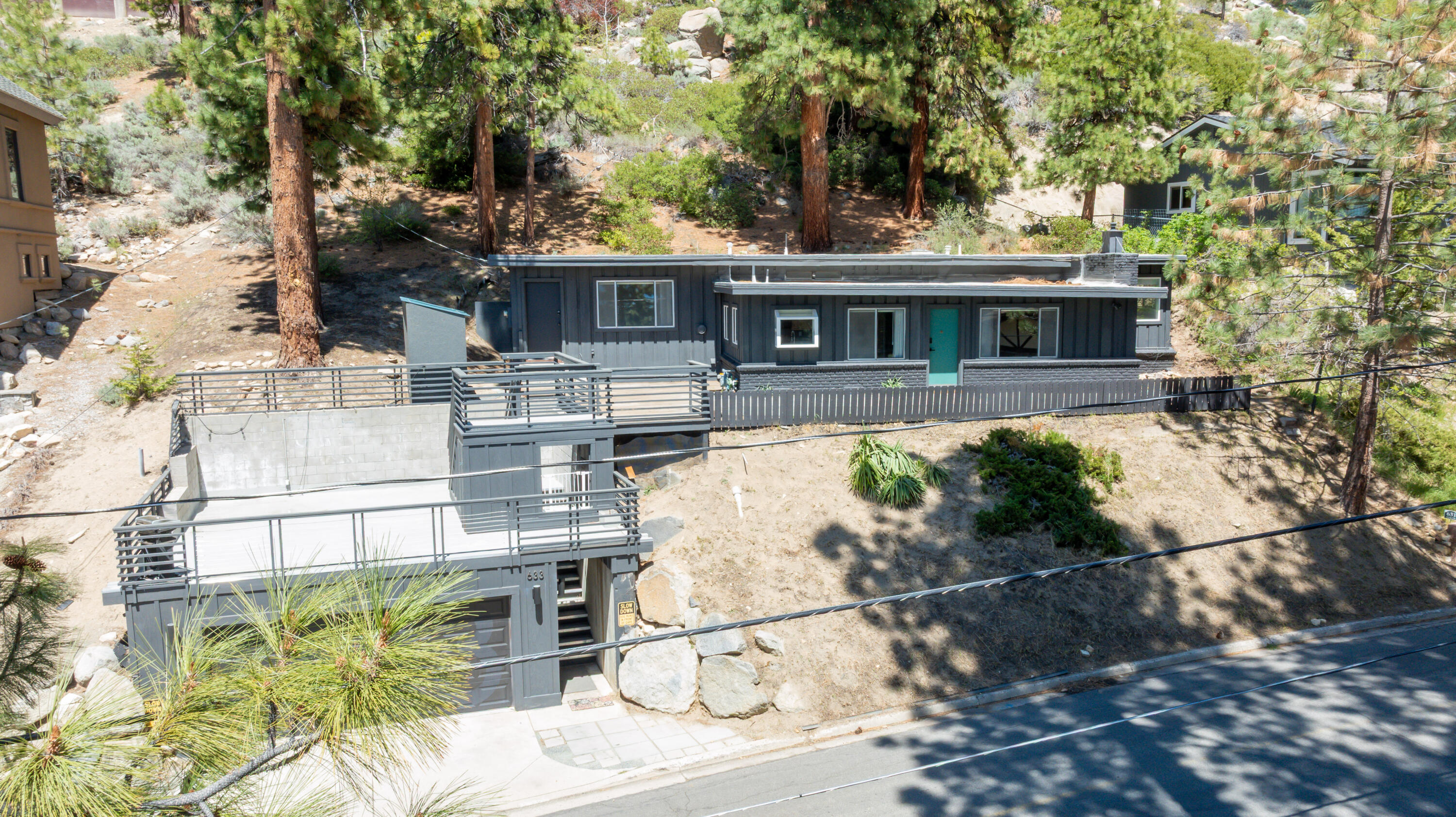 633 Don Drive Zephyr Cove, NV 89448 - Photo 5 of 38 a front view of a house with garden