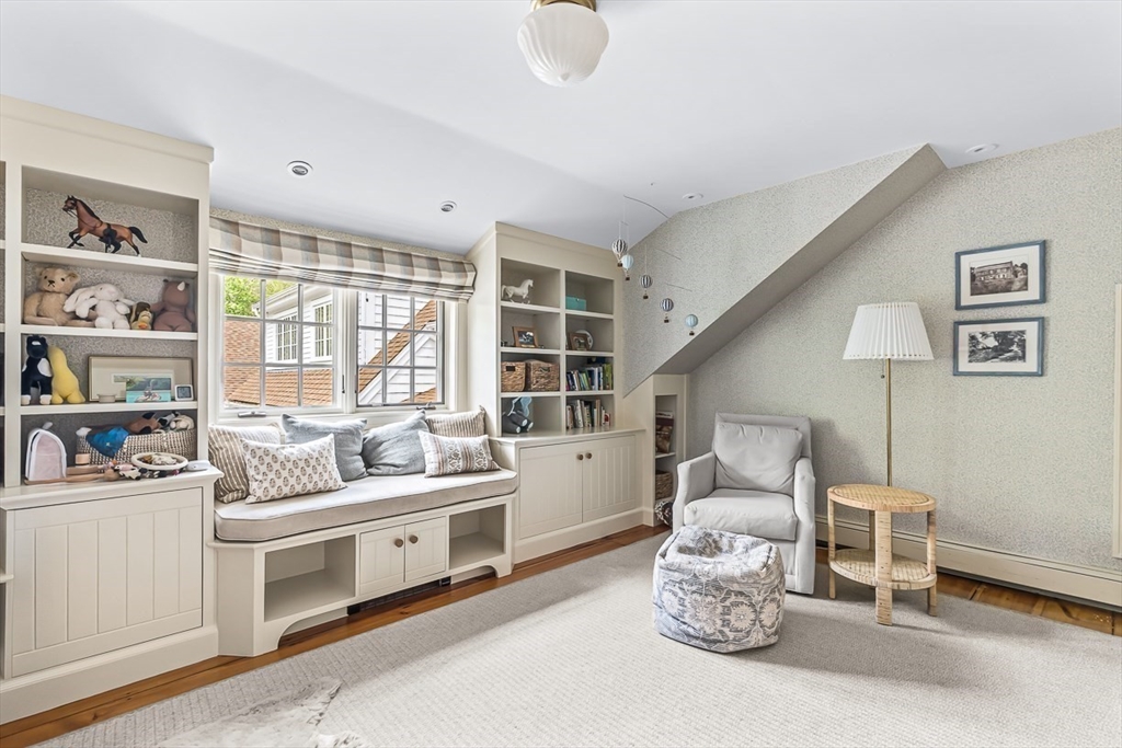 60 Washington Street, Unit 60 Sherborn, MA 01770 - Photo 11 of 15 a living room with furniture and a large window
