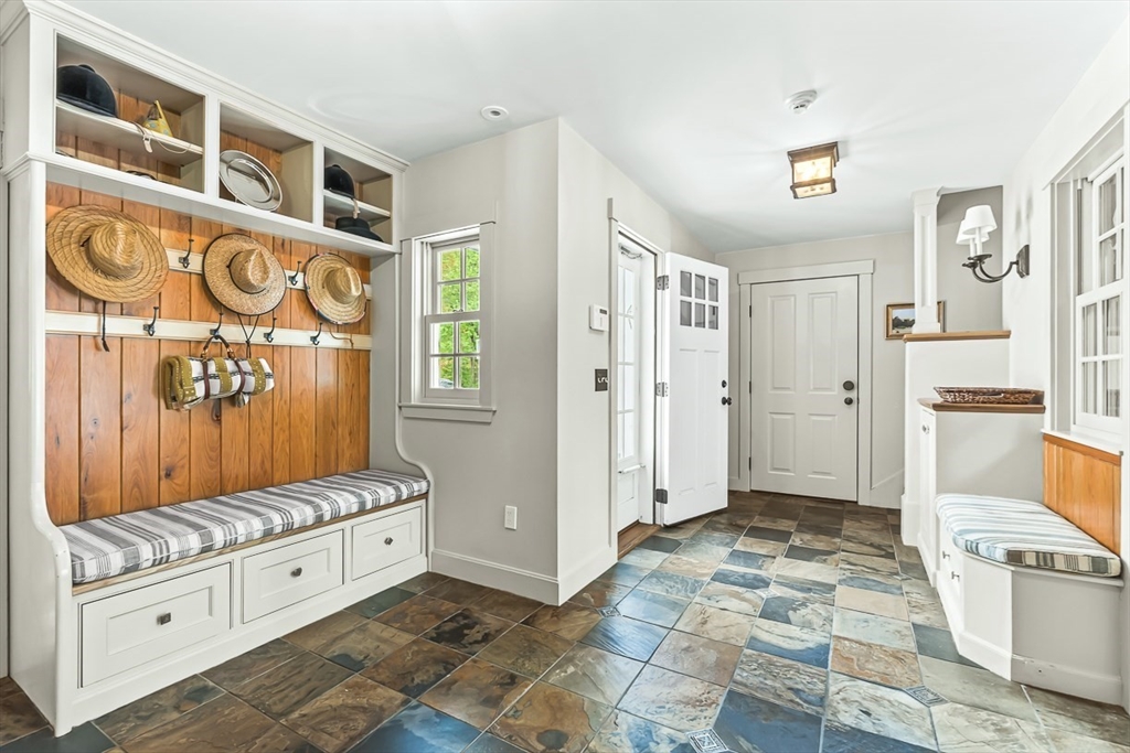 60 Washington Street, Unit 60 Sherborn, MA 01770 - Photo 6 of 15 a bedroom with a large bed and a window