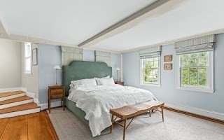 60 Washington Street, Unit 60 Sherborn, MA 01770 - Photo 8 of 15 a bedroom with a bed and a window