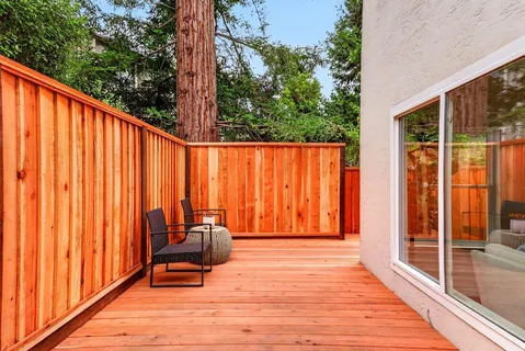 a backyard of a house with seating space