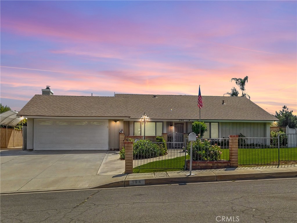 194 West Rosa Court Colton, CA 92324 - Photo 1 of 1 front view of a house with a street