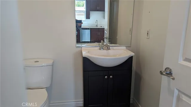 a bathroom with a sink and a toilet