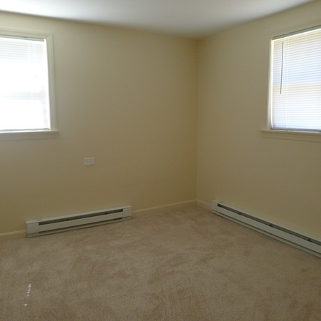 21 Folly Mill Road, Unit 2B Seabrook, NH 03874 - Photo 8 of 9 an empty room with a window