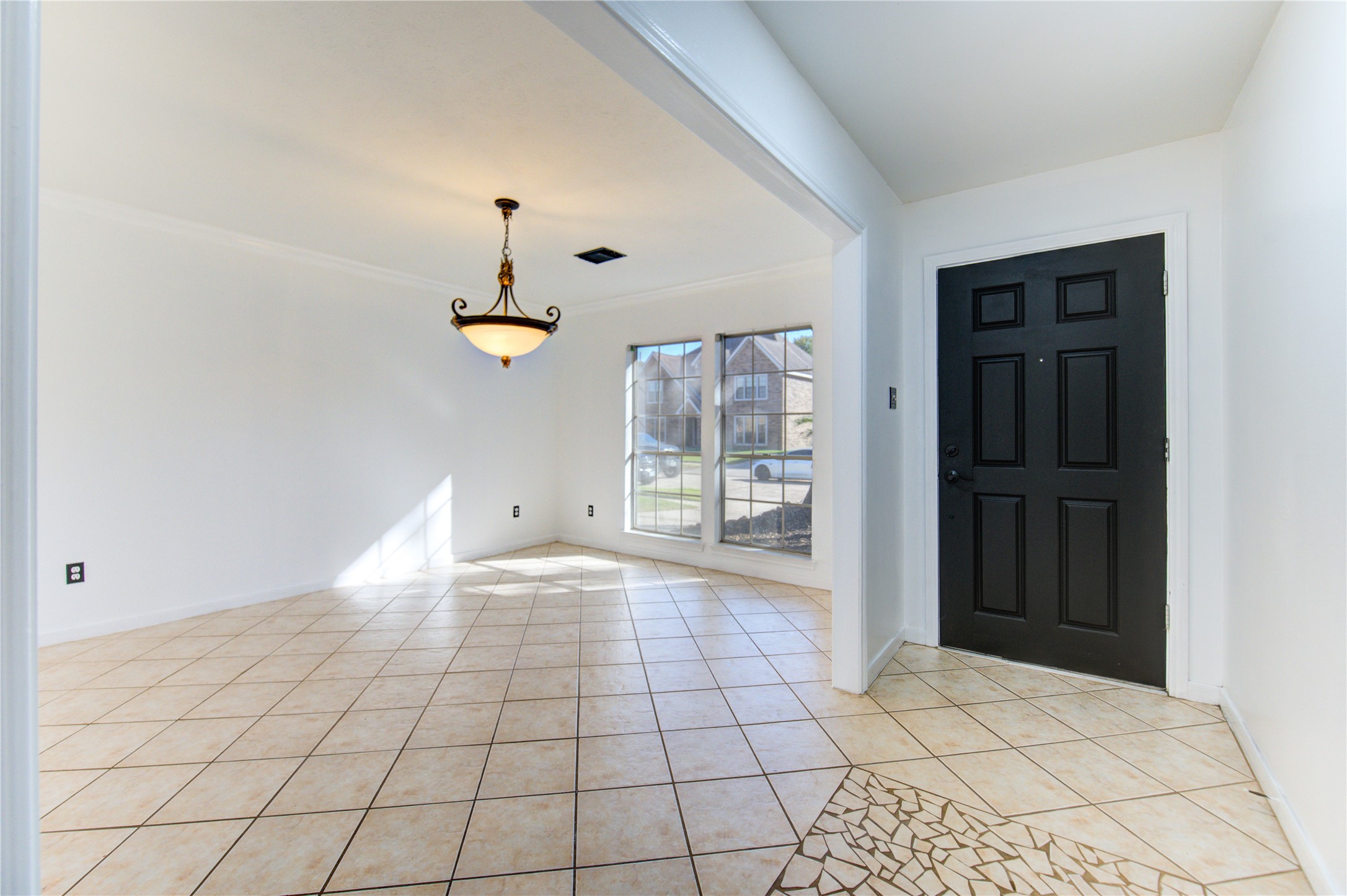 5931 Thom Road Humble, TX 77346 - Photo 3 of 18 a view of an empty room and window