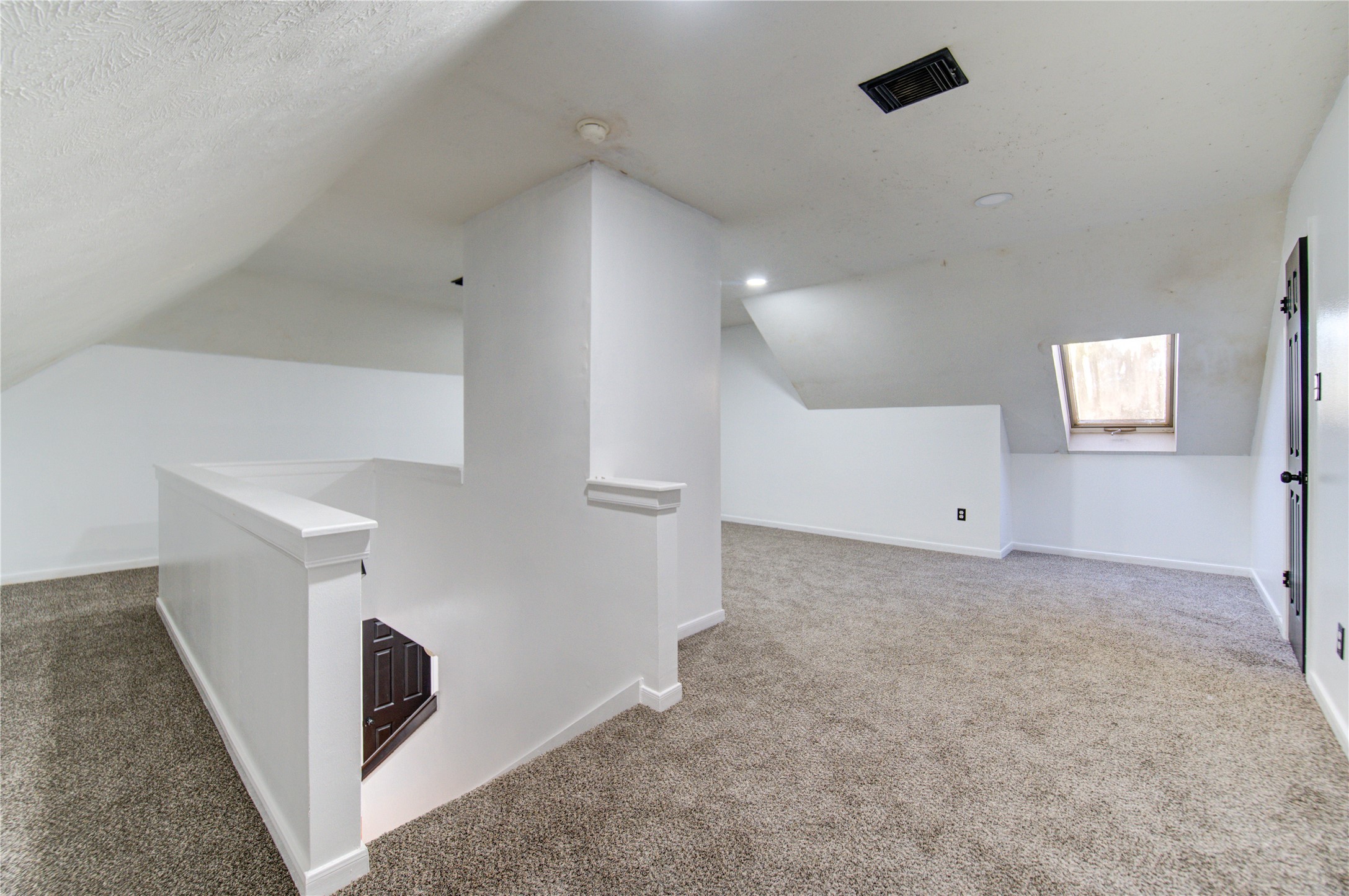 5931 Thom Road Humble, TX 77346 - Photo 9 of 18 a view of a livingroom with white cabinets