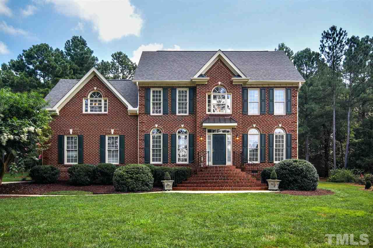 3920 Lauriston Road Raleigh, NC 27616 - Photo 1 of 27 a front view of a house with a yard