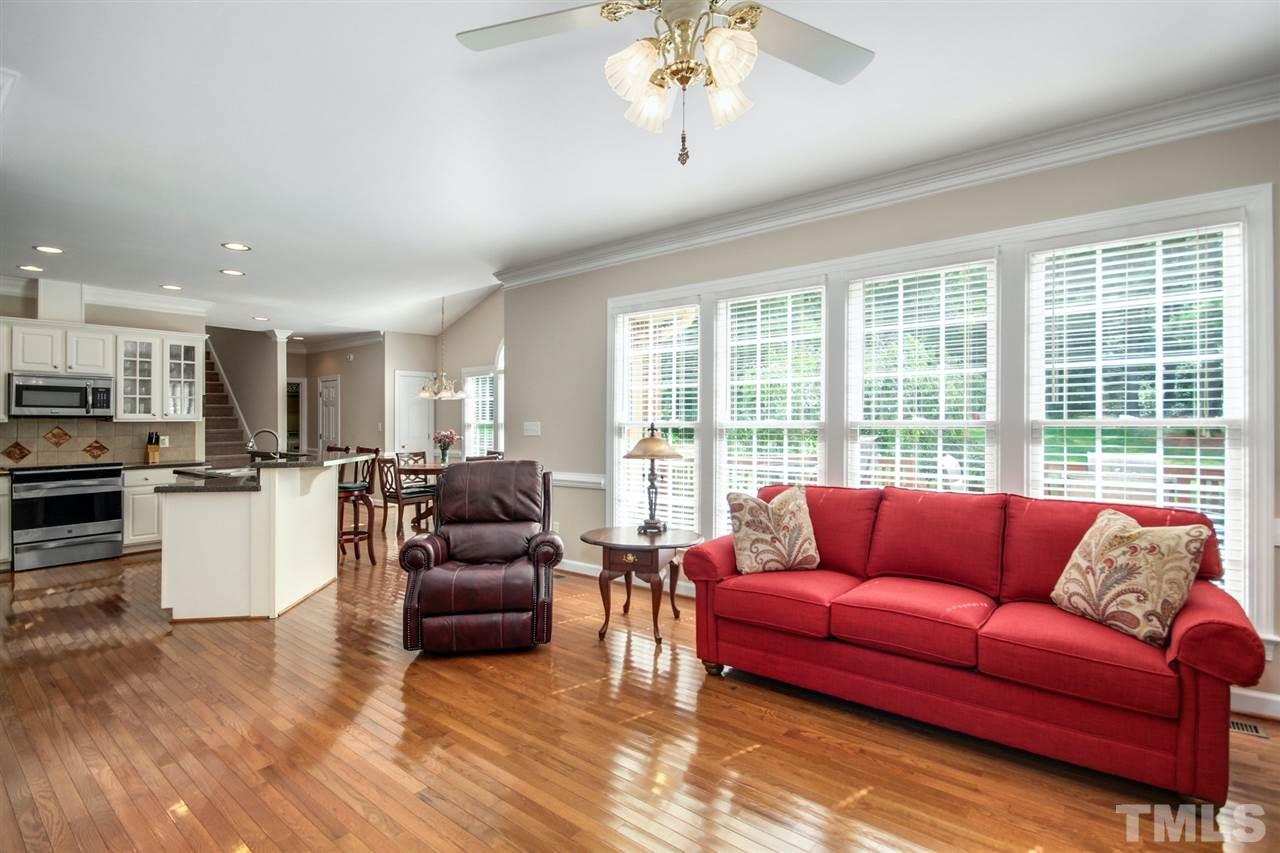 3920 Lauriston Road Raleigh, NC 27616 - Photo 13 of 27 a living room with furniture and a large window