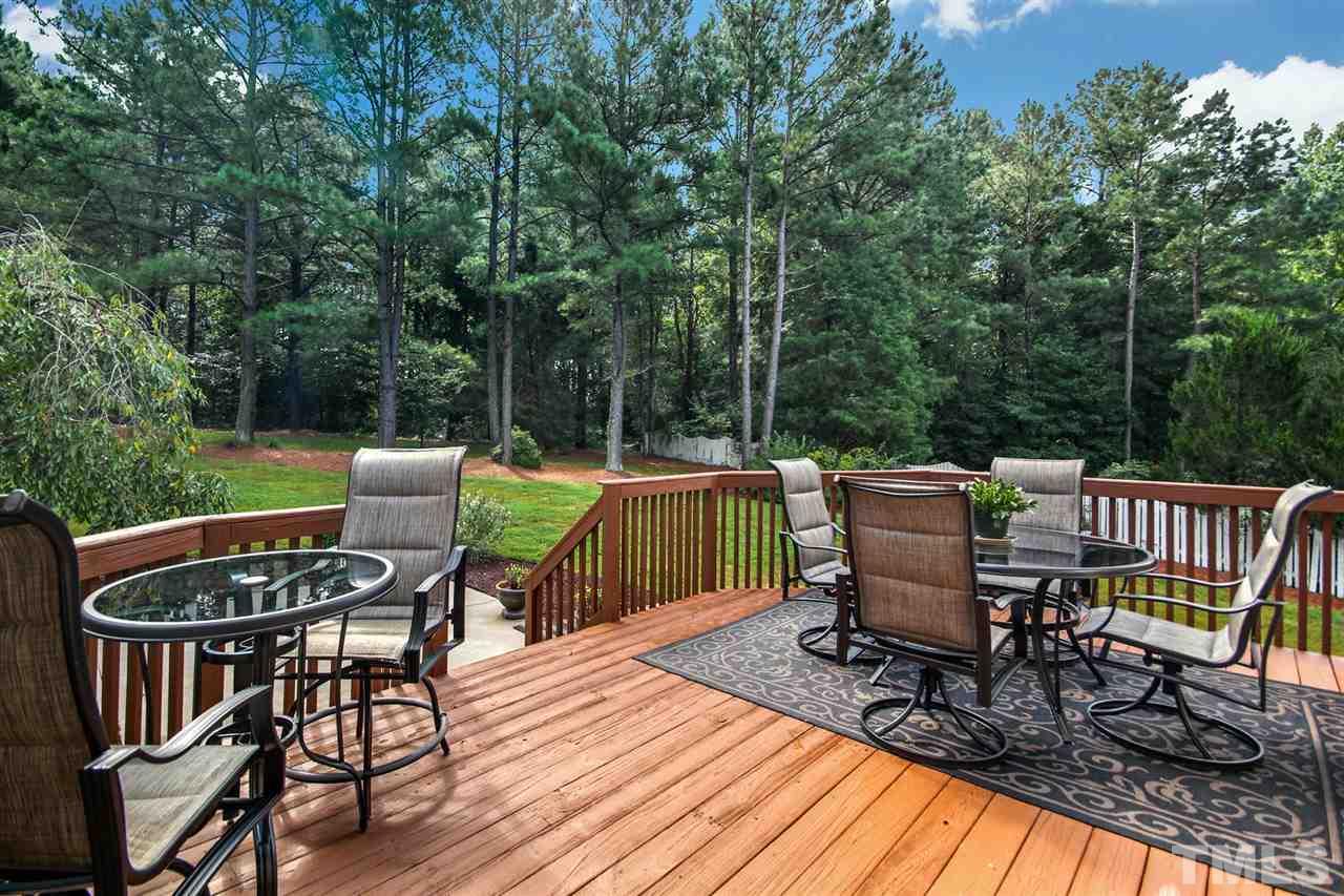 3920 Lauriston Road Raleigh, NC 27616 - Photo 22 of 27 a view of a chairs and table on the deck