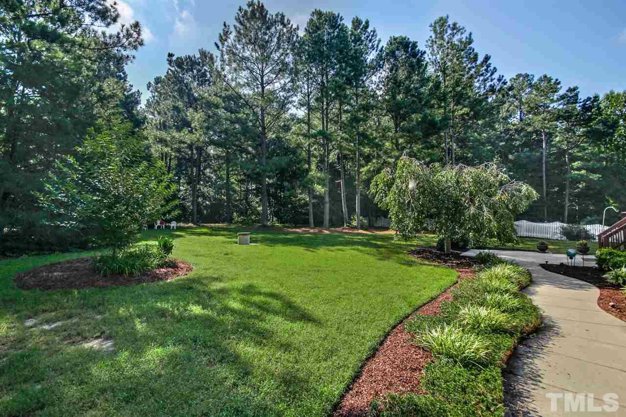 3920 Lauriston Road Raleigh, NC 27616 - Photo 23 of 27 a view of a garden with houses