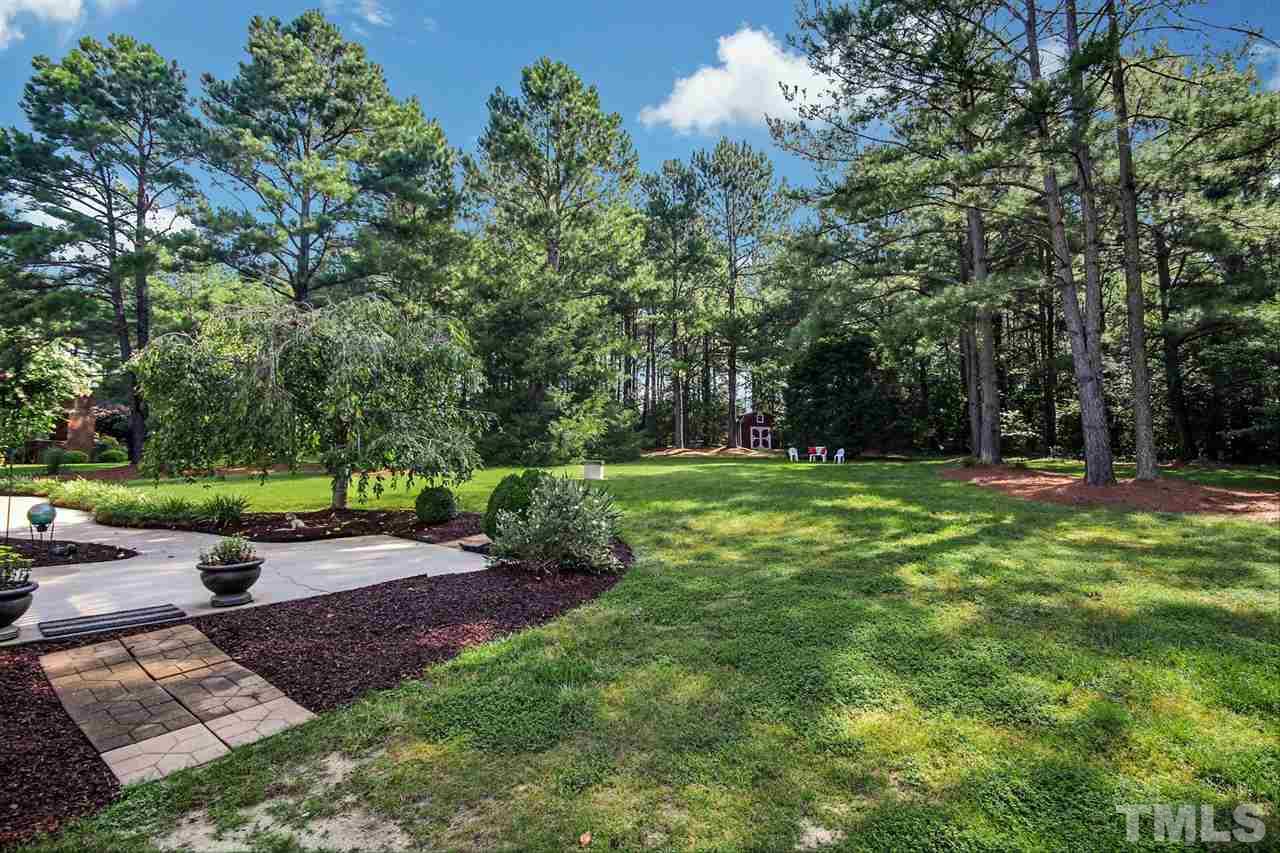 3920 Lauriston Road Raleigh, NC 27616 - Photo 24 of 27 a view of a park with large trees
