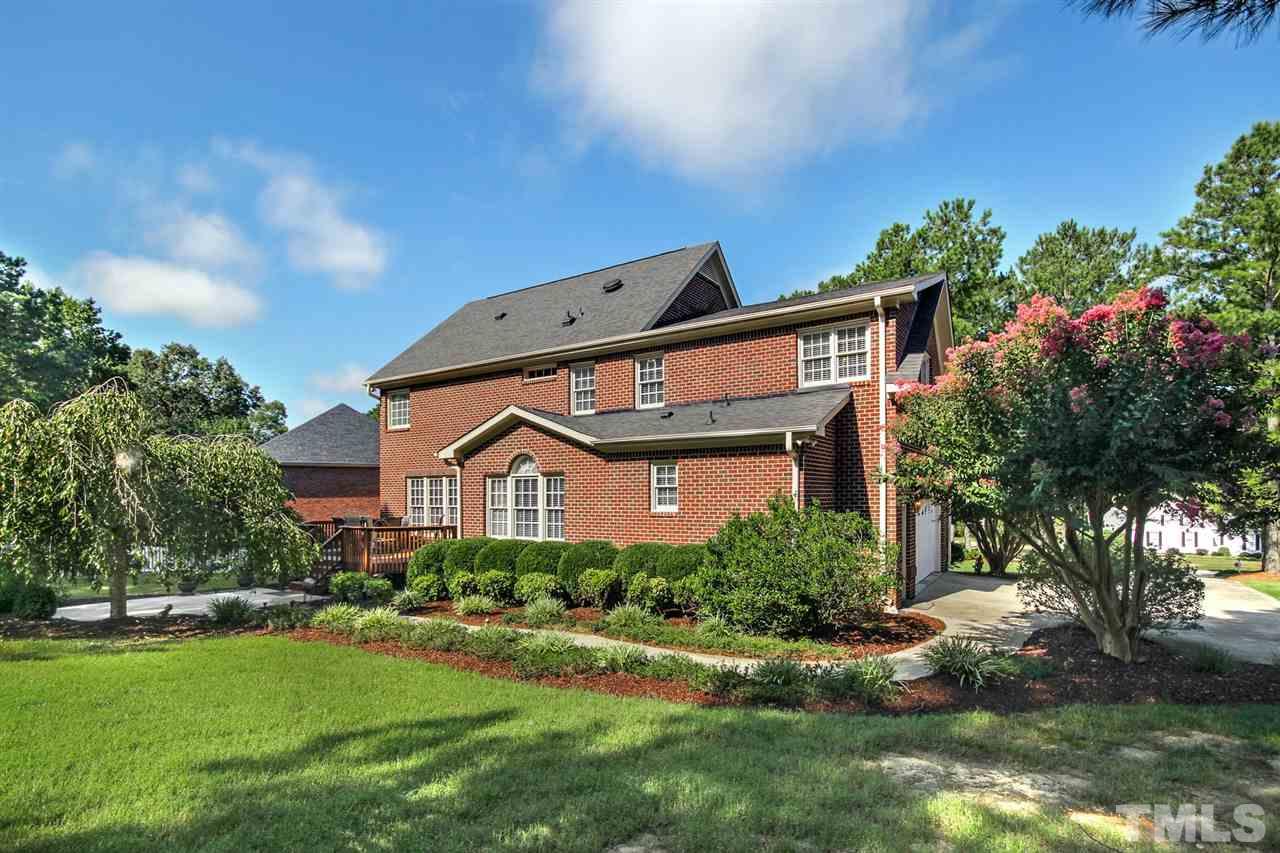3920 Lauriston Road Raleigh, NC 27616 - Photo 25 of 27 a front view of a house with a yard