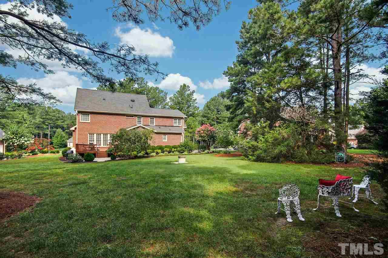 3920 Lauriston Road Raleigh, NC 27616 - Photo 26 of 27 a front view of a house with garden