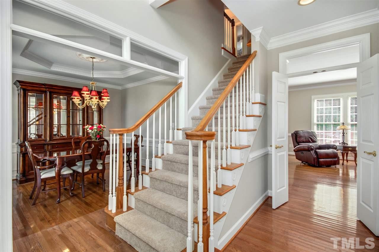 3920 Lauriston Road Raleigh, NC 27616 - Photo 4 of 27 a view of entryway and hall with wooden floor