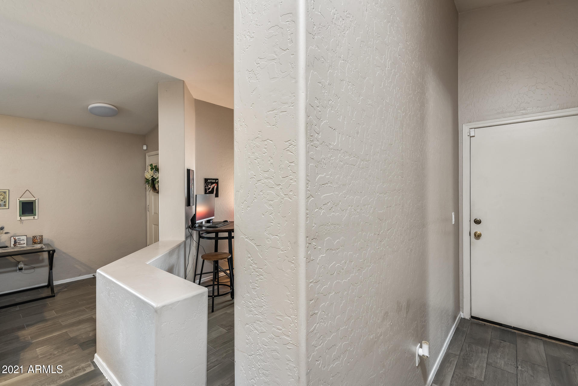 15037 West Calavar Road Surprise, AZ 85379 - Photo 11 of 28 a close view of a sink and a refrigerator in a room