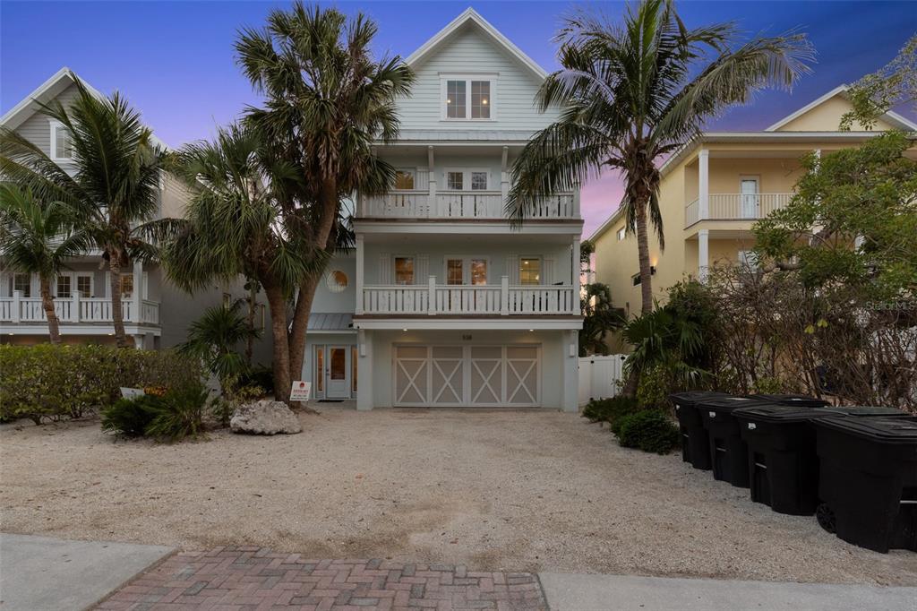 538 Canal Road Sarasota, FL 34242 - Photo 14 of 49 a front view of a house with a yard