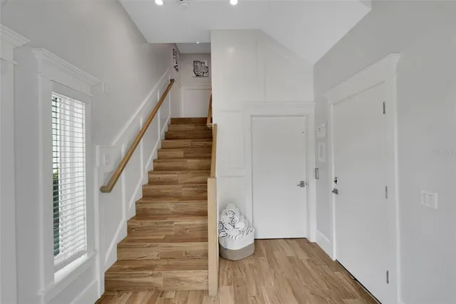 a view of entryway with wooden floor