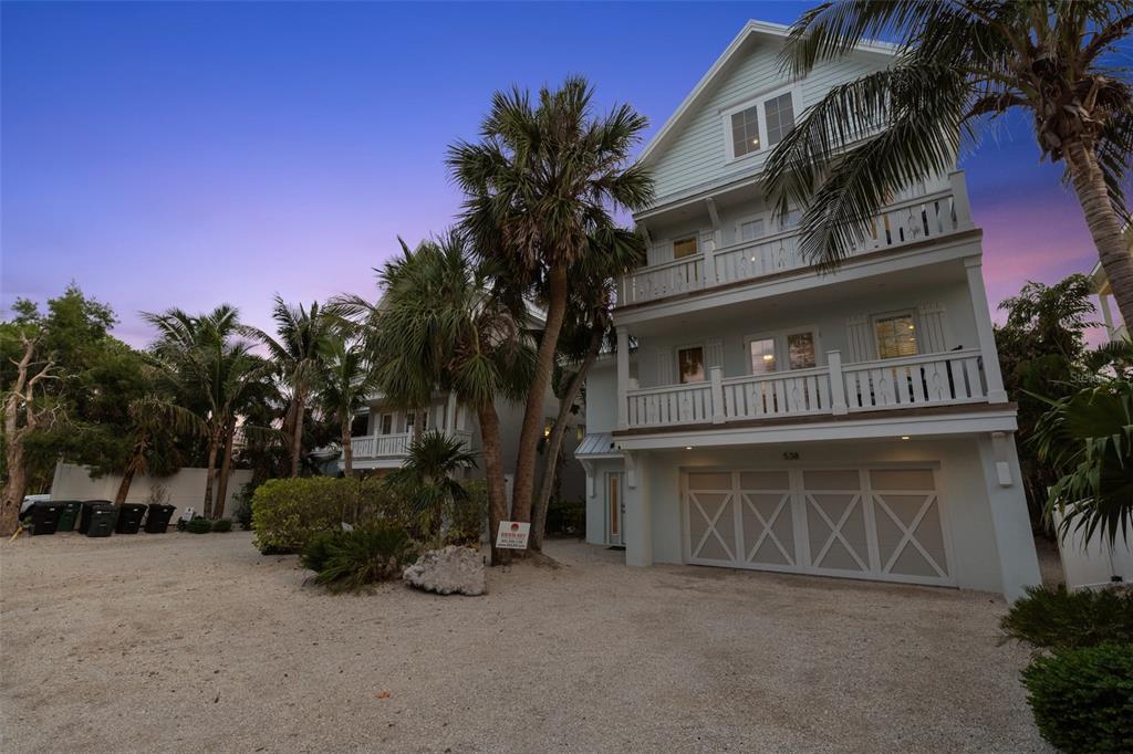 538 Canal Road Sarasota, FL 34242 - Photo 35 of 49 a view of a house with a yard