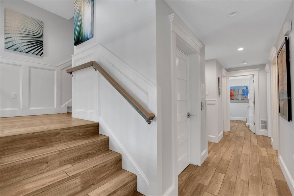 538 Canal Road Sarasota, FL 34242 - Photo 39 of 49 a view of entryway with wooden floor and stairs
