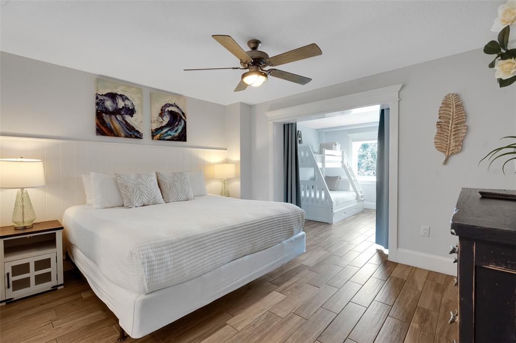 538 Canal Road Sarasota, FL 34242 - Photo 42 of 49 a bedroom with a bed and a table