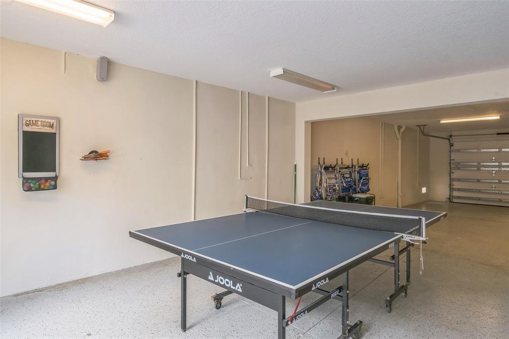 538 Canal Road Sarasota, FL 34242 - Photo 45 of 49 a room with pool table and windows