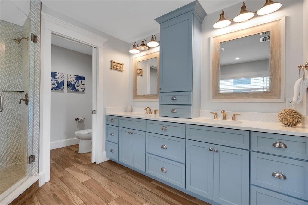 538 Canal Road Sarasota, FL 34242 - Photo 10 of 49 a spacious bathroom with a granite countertop sink mirror and toilet
