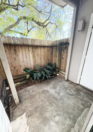 a view of a backyard of a house