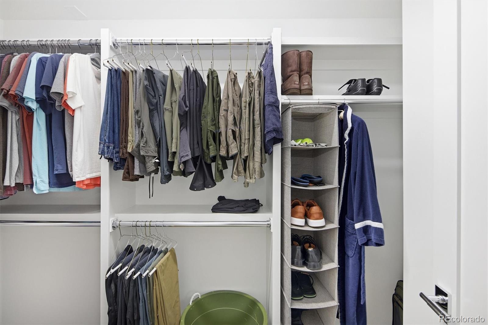 1650 Fillmore Street, Unit 1107 Denver, CO 80206 - Photo 29 of 49 a view of walk in closet with clothes and shoes