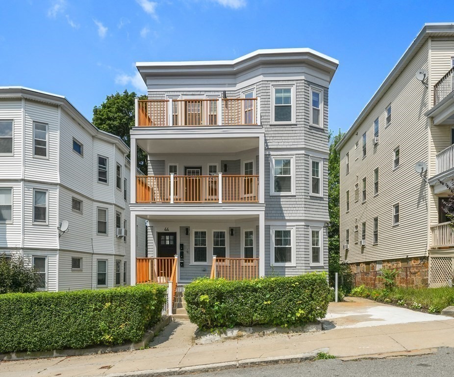 44 Iffley Road, Unit 2 Boston, MA 02130 - Photo 1 of 1 a front view of a house with a yard