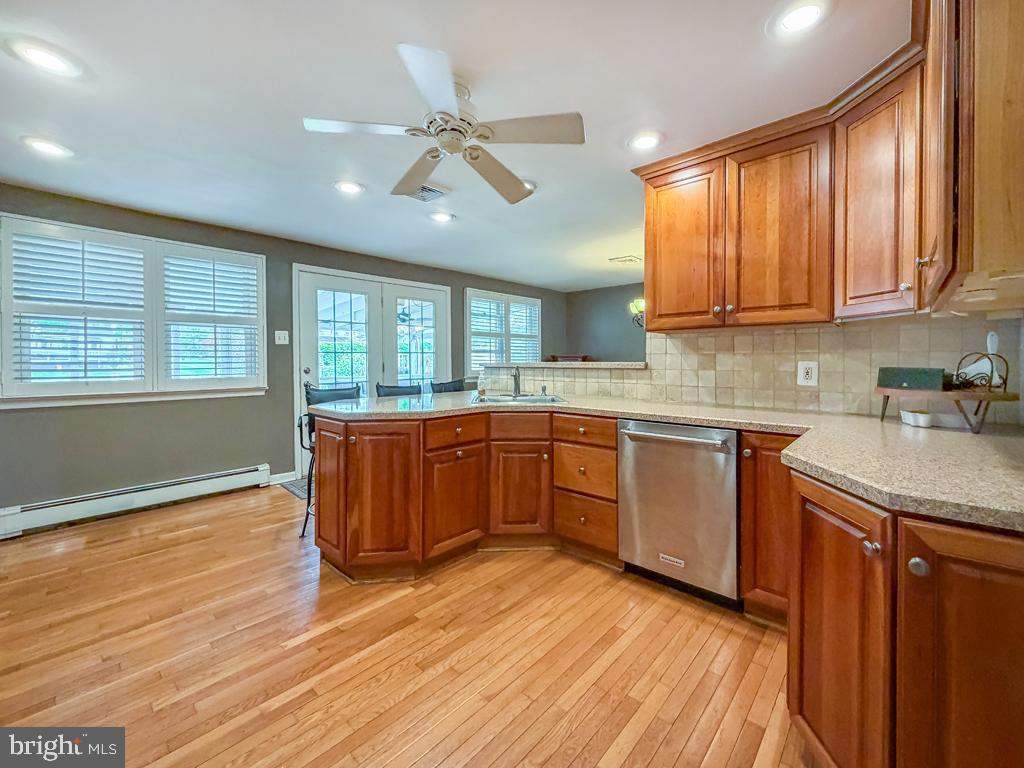 21 Rotterdam Road North Holland, PA 18966 - Photo 21 of 58 Kitchen w/French Doors Leading to Enclosed Sunroom