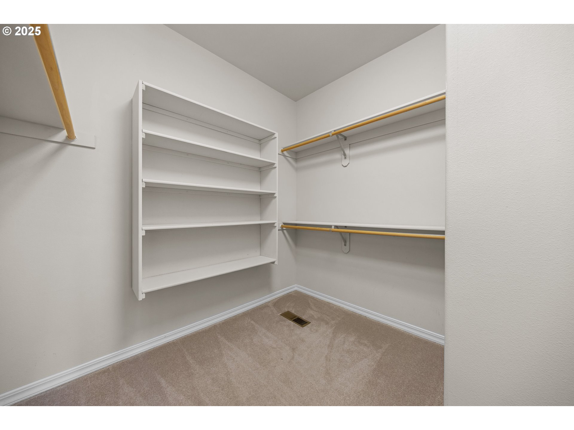 60799 Currant Way Bend, OR 97702 - Photo 14 of 28 a view of an empty walk in closet
