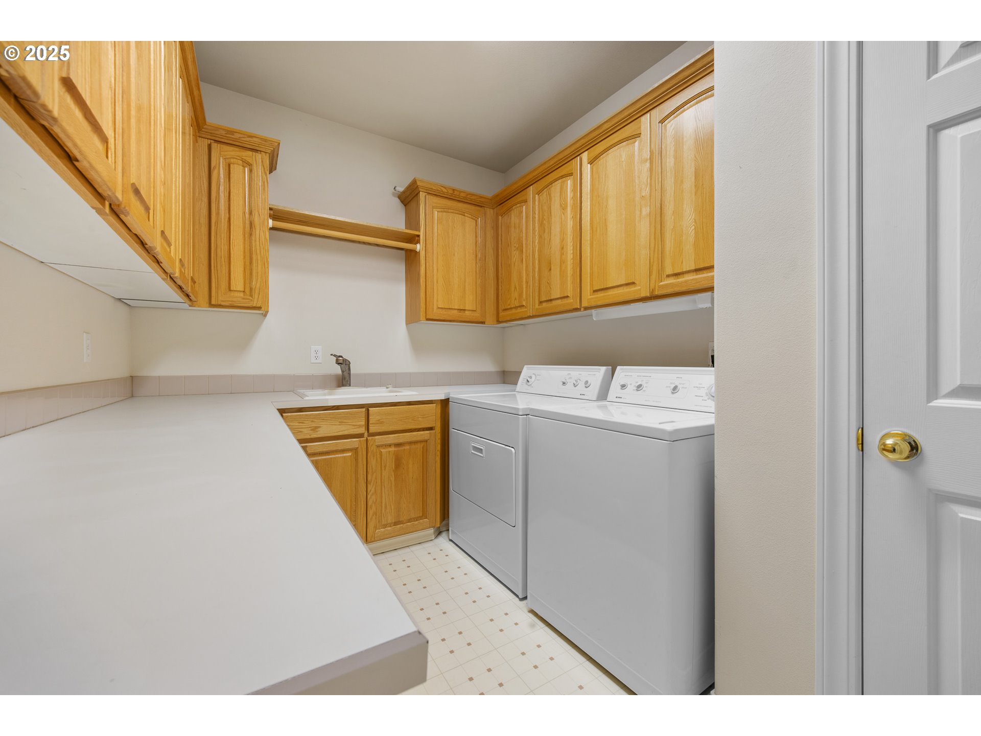 60799 Currant Way Bend, OR 97702 - Photo 20 of 28 a utility room with closet dryer and washer