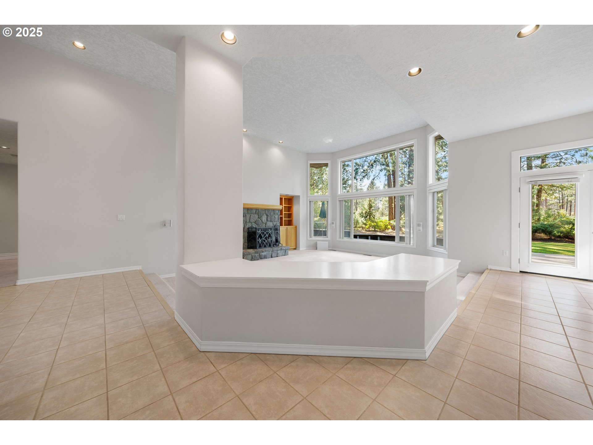 60799 Currant Way Bend, OR 97702 - Photo 7 of 28 a living room with furniture and a flat screen tv