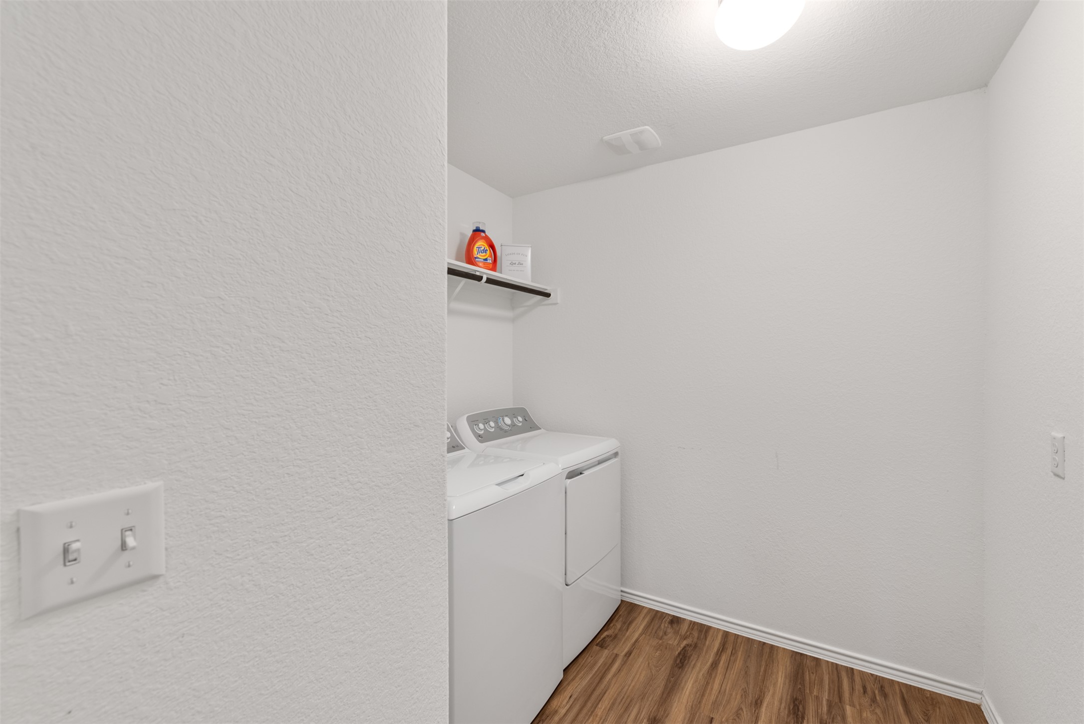 230 Crystal River Road Kyle, TX 78640 - Photo 15 of 27 Dedicated laundry room off the primary bedroom