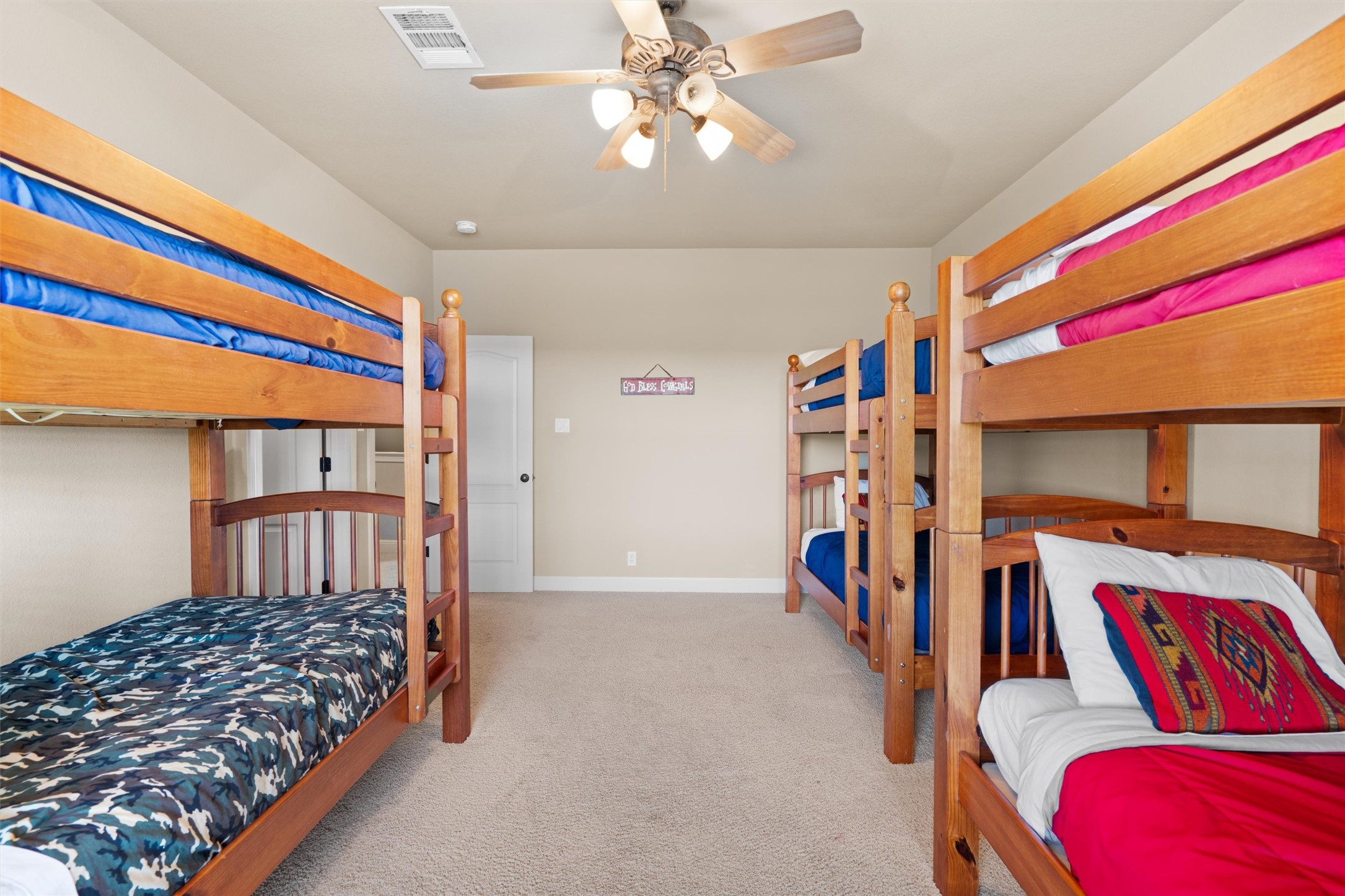 1017 Coventry Road Spicewood, TX 78669 - Photo 29 of 43 a bedroom with a bed and closet